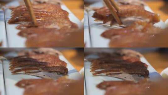 筷子夹起鸭肉的动作微距特写高清在线视频素材下载