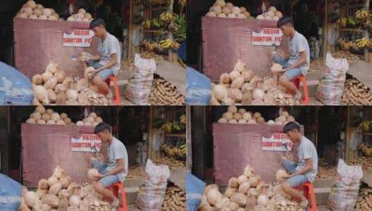 男人砍椰子的跟踪镜头高清在线视频素材下载