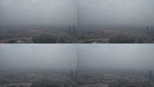 秋冬季雾霾中的城市航拍高清在线视频素材下载