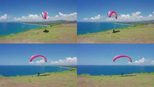 海南万宁海边滑翔伞航拍高清在线视频素材下载