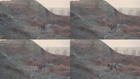 朋友在山路上聊天和散步高清在线视频素材下载