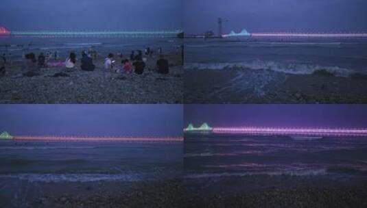 大连星海公园岸边看星海湾湾大桥夜景高清在线视频素材下载