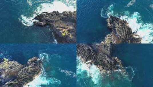 海浪翻涌拍打着小岛礁石高清在线视频素材下载