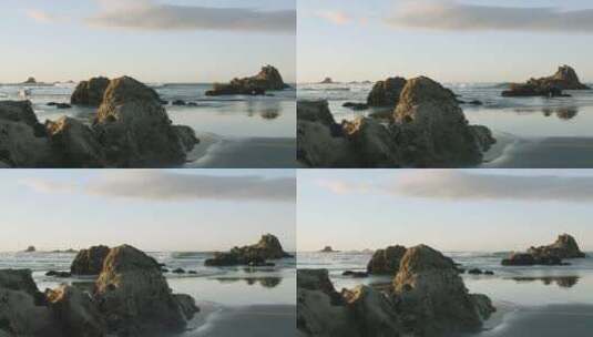 清晨海边海浪拍打礁石海岸海鸥飞翔高清在线视频素材下载