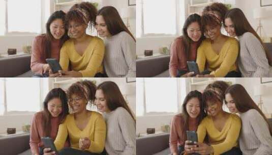 三个多种族的女性朋友在家里玩手机高清在线视频素材下载