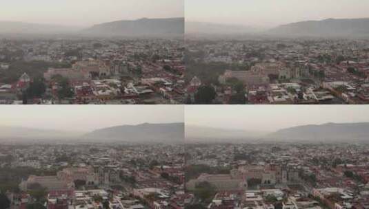 清晨，天线正飞向墨西哥瓦哈卡的圣多明戈寺高清在线视频素材下载