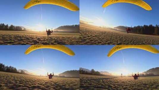 FPV无人机航拍动力滑翔伞飞行日出森林草地高清在线视频素材下载