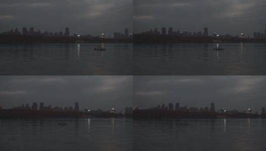 武汉东湖地拍夜晚湖面游客游船高清在线视频素材下载