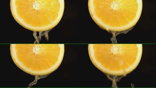 一片橙子水果在彩色背景上的特写高清在线视频素材下载