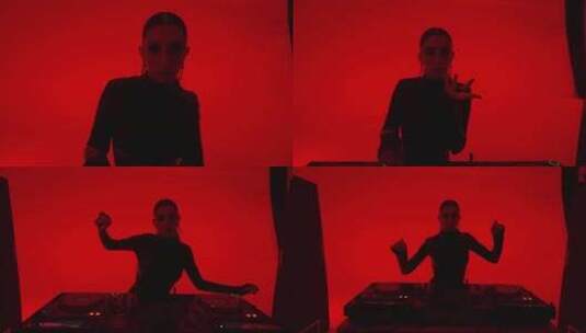 工作室中DJ控制台后面的女DJ肖像，红色高清在线视频素材下载