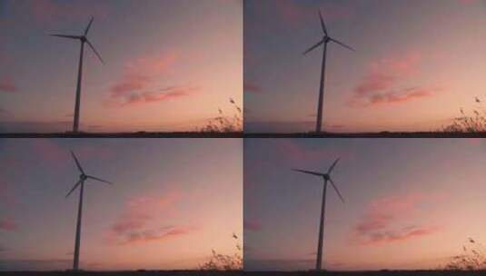 黄昏中的风力发电车在转动高清在线视频素材下载