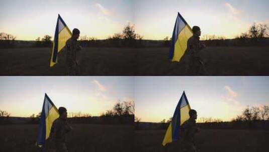 穿着制服的年轻男性军人带着乌克兰国旗在乌高清在线视频素材下载