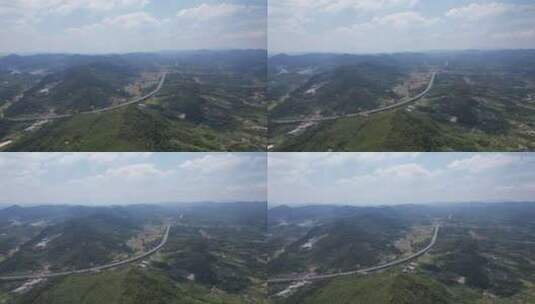 大山中的高速公路交通航拍高清在线视频素材下载