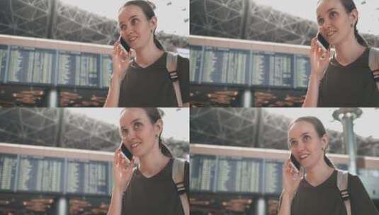 女旅客在机场打手机高清在线视频素材下载