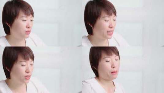 对着镜头说话  做介绍的中国年轻女性高清在线视频素材下载