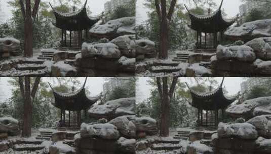 雪中的北京紫竹院公园内的远亭高清在线视频素材下载