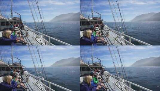游艇上拍照的游客高清在线视频素材下载