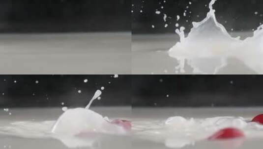 慢镜头拍摄新鲜爆浆小番茄落入牛奶创意视频高清在线视频素材下载