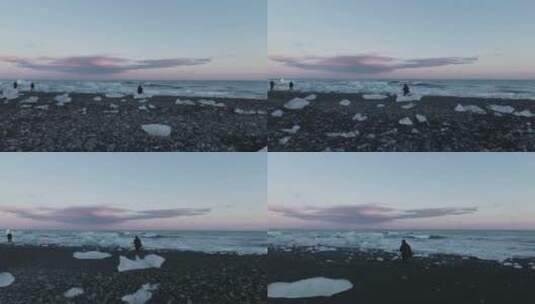在结冰的海滩上的摄影师高清在线视频素材下载