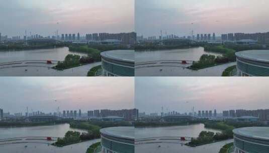 洛阳航拍城市风光4k原创地貌新区洛河日落高清在线视频素材下载