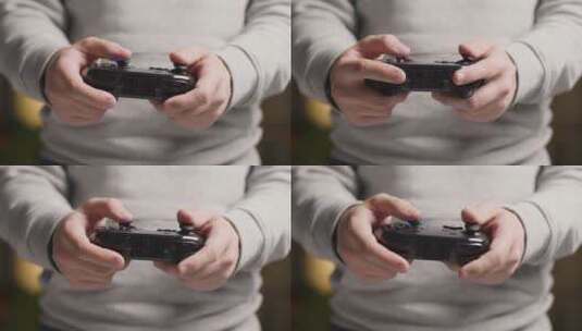 用视频游戏控制器玩游戏的男人高清在线视频素材下载