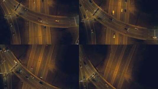 空中，垂直的夜间交通。迂回在高速公路高清在线视频素材下载