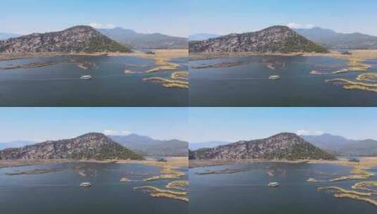 在土耳其绿色山脉的背景下，用游船的无人机拍摄，高清在线视频素材下载