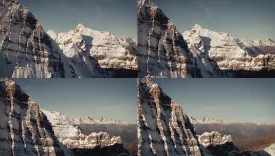 巍峨山峰山脉山峦航拍阳光下的雪山高清在线视频素材下载