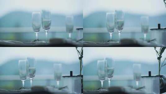 餐桌上的玻璃高脚红酒杯高清在线视频素材下载
