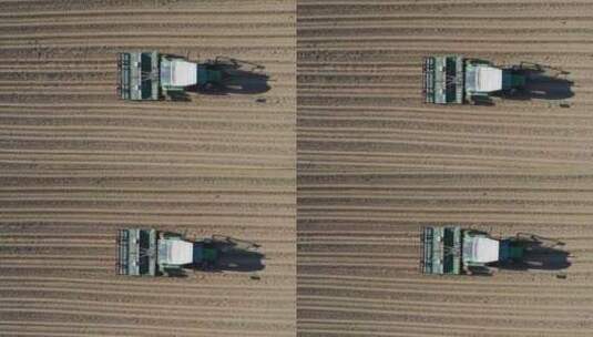 大型农田收割机在田间作业高清在线视频素材下载