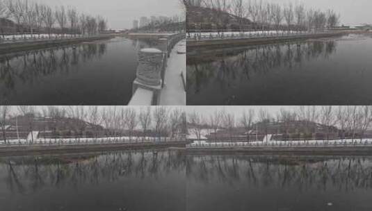 郑州贾鲁河岸边冬季下雪风景素材高清在线视频素材下载