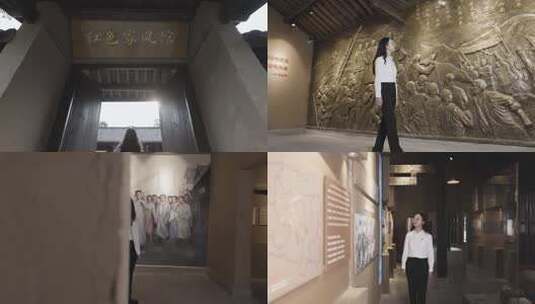 红色家风馆女子参观革命主题浮雕场景高清在线视频素材下载