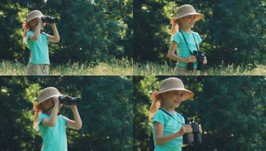 女孩通过双筒望远镜看远处的风景高清在线视频素材下载