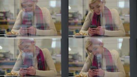美丽的女人在咖啡馆用电话高清在线视频素材下载