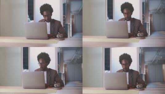 男人拿着笔记本电脑在咖啡办公高清在线视频素材下载