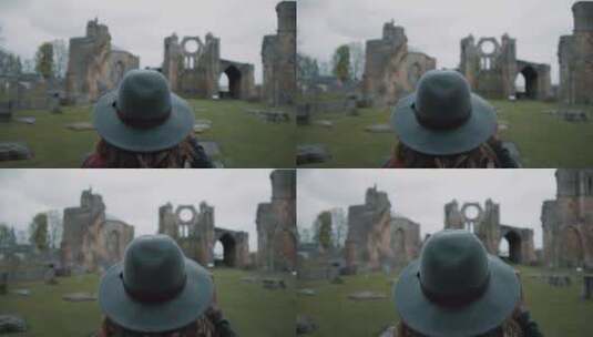 女摄影师给教堂废墟拍照高清在线视频素材下载