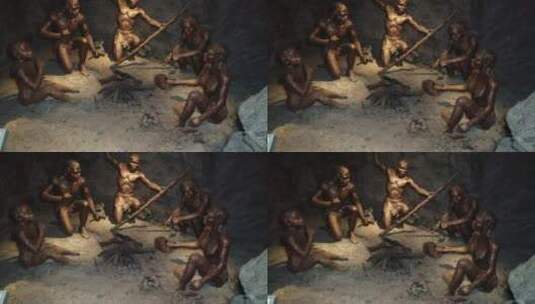 原始人祖先在山洞里烤火的雕像高清在线视频素材下载
