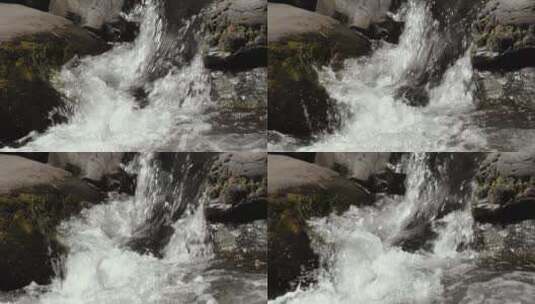 岩石间湍急的溪水高清在线视频素材下载