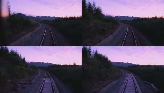 火车尾窗外铁路轨道夕阳晚霞风光高清在线视频素材下载