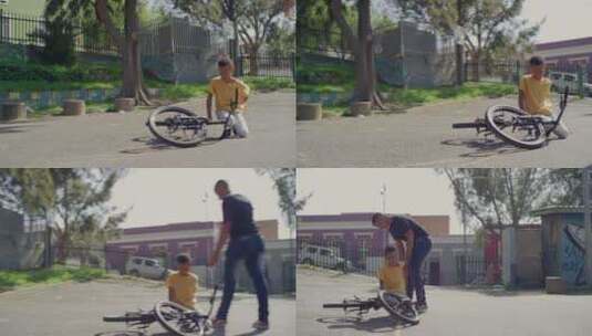 男孩骑自行车摔倒高清在线视频素材下载