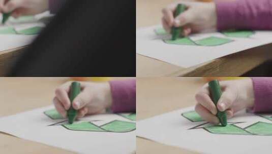 使用绿色蜡笔的儿童特写高清在线视频素材下载
