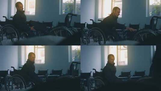 一名男子在工厂挑选轮椅高清在线视频素材下载