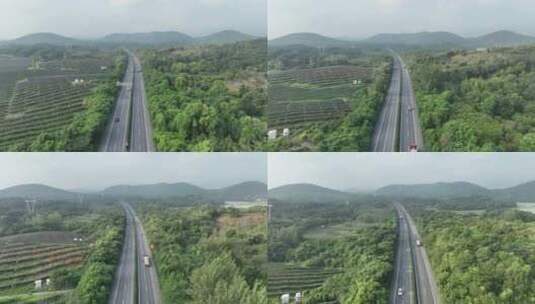 高速公路经过森林航拍高清在线视频素材下载
