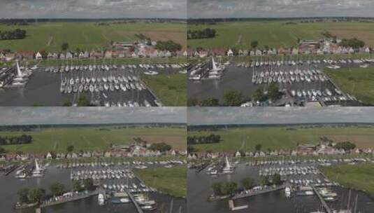 空中备份显示阿姆斯特丹附近的小村庄Durgerdam及其休闲港口区高清在线视频素材下载