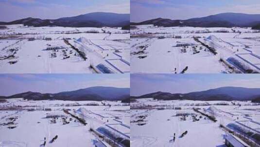 航拍东北黑龙江漠河马车建筑雪景美丽风光高清在线视频素材下载