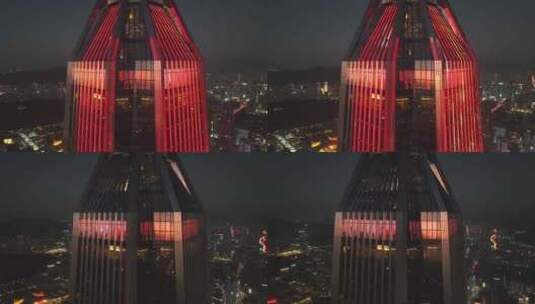 航拍深圳平安金融中心玻璃幕墙反光夜景灯光高清在线视频素材下载