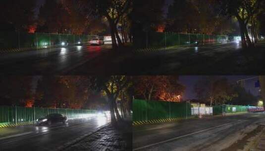 夜间道路施工围挡行人汽车行驶路上高清在线视频素材下载