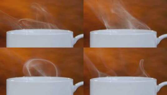 白色清爽的咖啡杯上冒起白色的热气高清在线视频素材下载