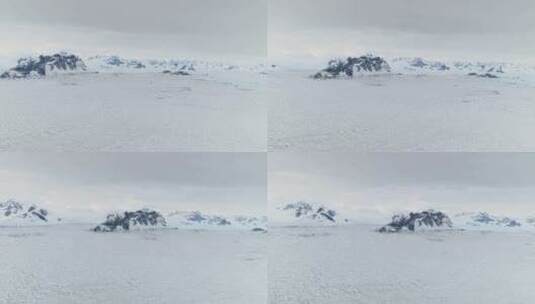 史诗南极洲雪岩景观鸟瞰图高清在线视频素材下载