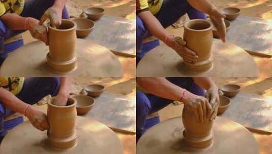 熟练的波特手在波特轮壶上塑造粘土投掷手工高清在线视频素材下载